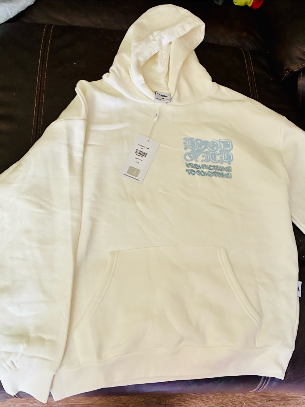 White Hoodie with Light Blue Gothic Chest Graphic